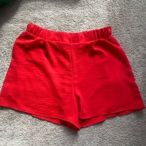 Red, elastic waist shorts